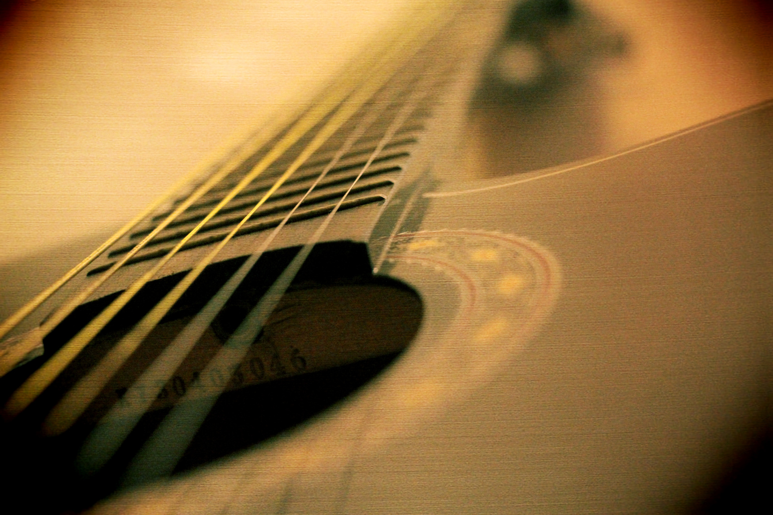 Close-up Photo of Black Guitar
